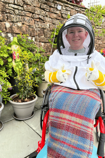 Noah posing in his bee suit